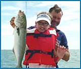 A young lady with her own big bluefish